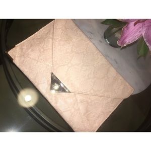 Nude snakeskin clutch